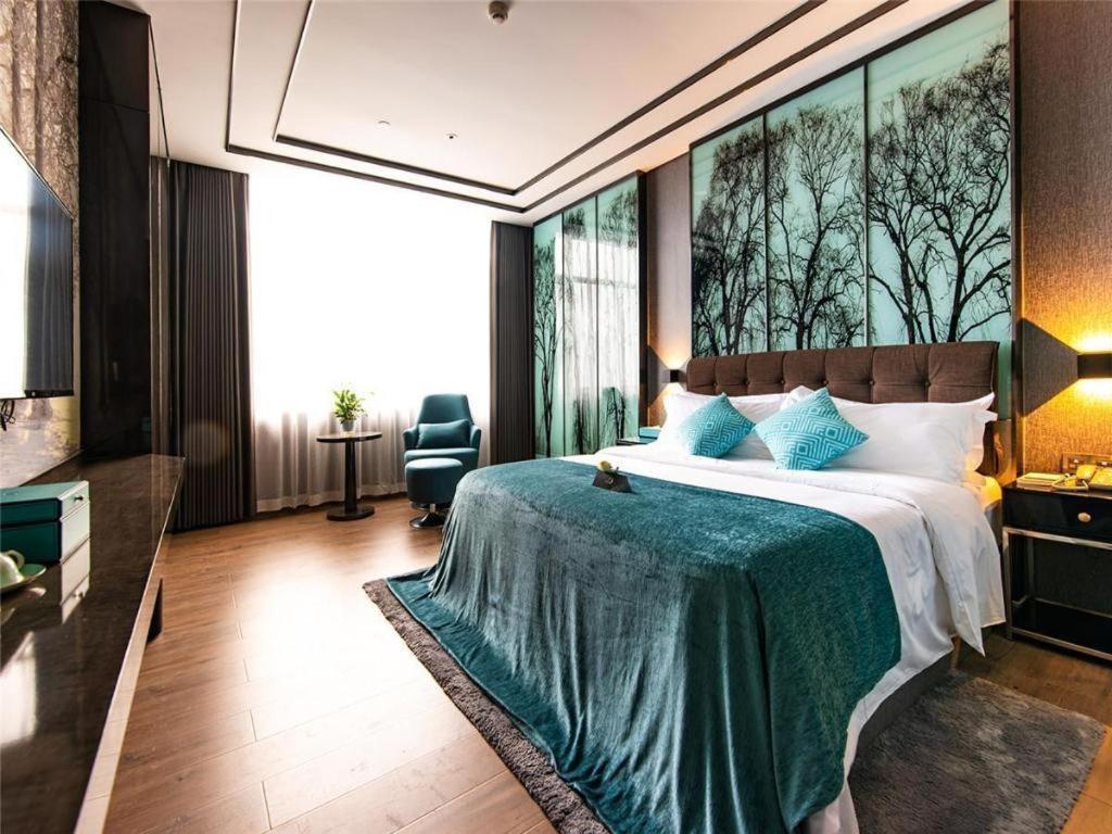 Xana Hotelle-Hotel Luzhou Baizitu Square Exterior foto